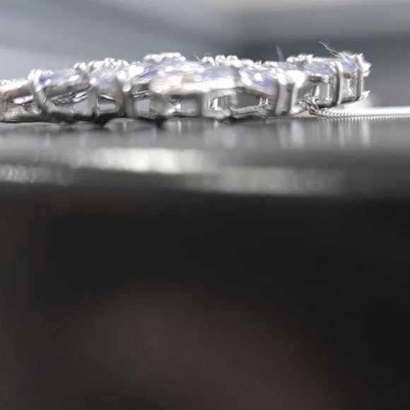 Elegant Silver and Tanzanite Jewelry Set - Picture 7 of 11